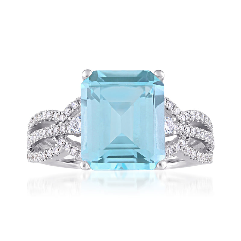 Sky blue topaz ring with diamond-accented white gold band