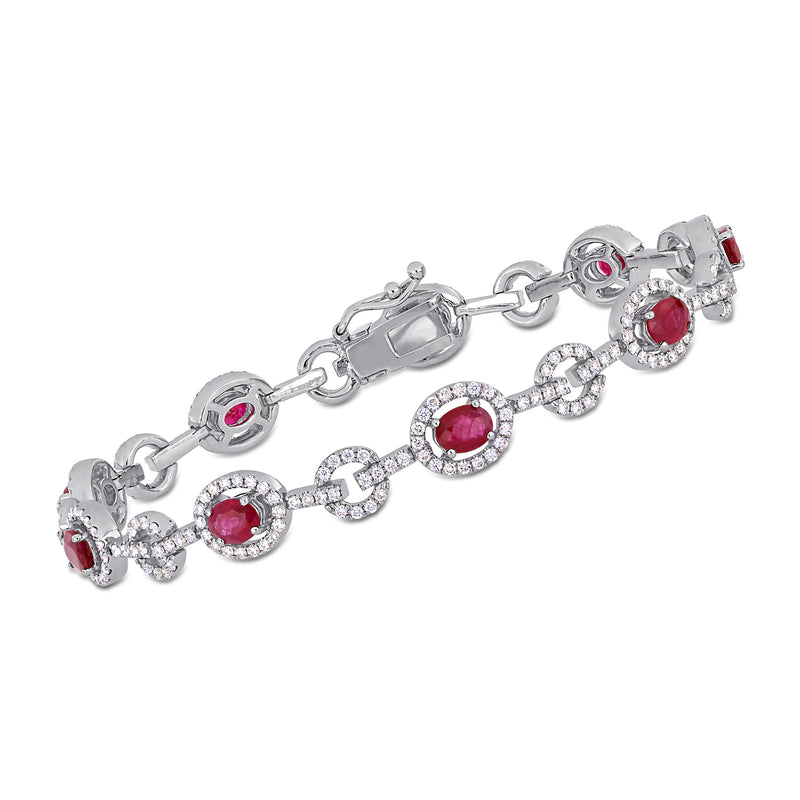 14kt white gold bracelet with oval rubies and diamond accents, hinged clasp