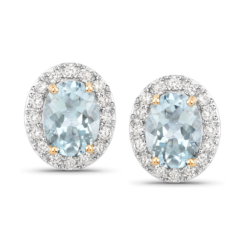 Aquamarine and diamond oval stud earrings in 14k yellow gold, post style