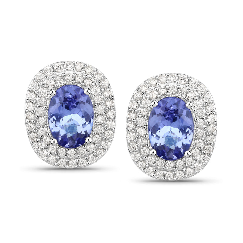 14kt white gold tanzanite and diamond stud earrings, blue oval center halo