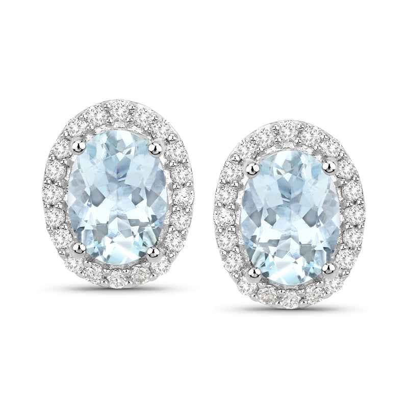 Aquamarine and diamond oval stud earrings in 14kt white gold, post style