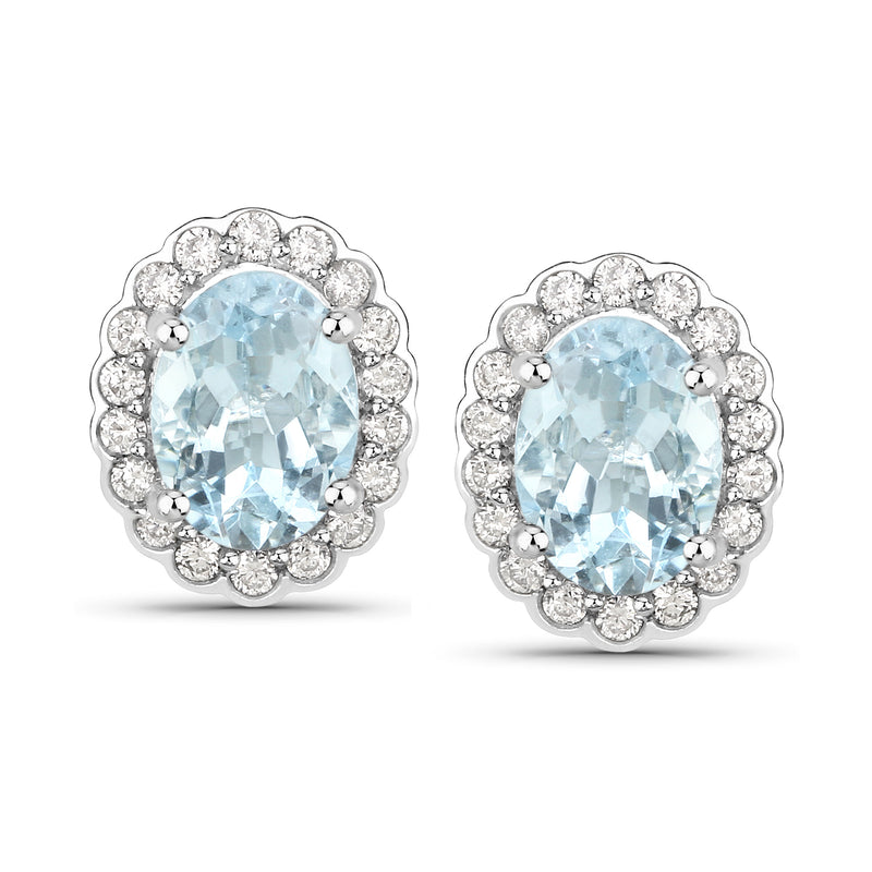 14kt white gold post earrings with oval aquamarine center and diamond scalloped halo