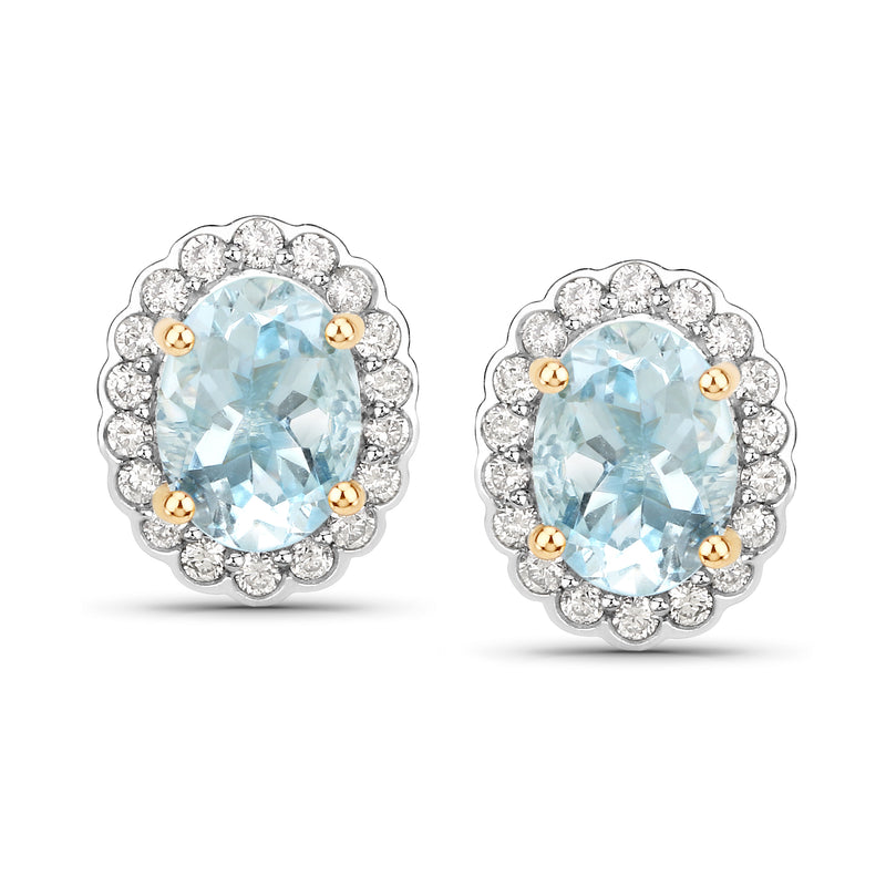 Scalloped aquamarine and diamond stud earrings with oval light-blue stones, 14k yellow gold