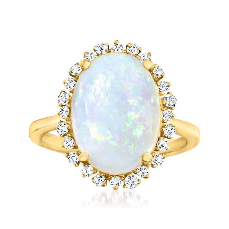 Opal and diamond ring in 14kt yellow gold, oval opal with round diamond halo