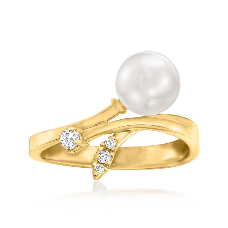 14kt yellow gold bypass ring with large cultured pearl and three round diamond accents