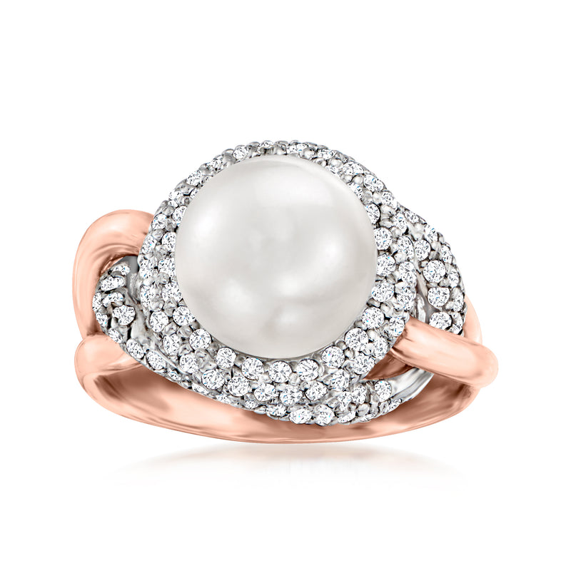 Two-tone gold swirl ring with large round white pearl and diamond halo