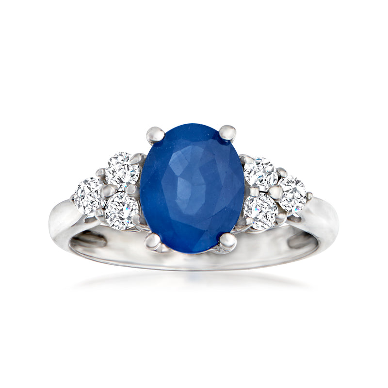 Oval blue sapphire ring with diamond cluster shoulders in 14kt white gold band