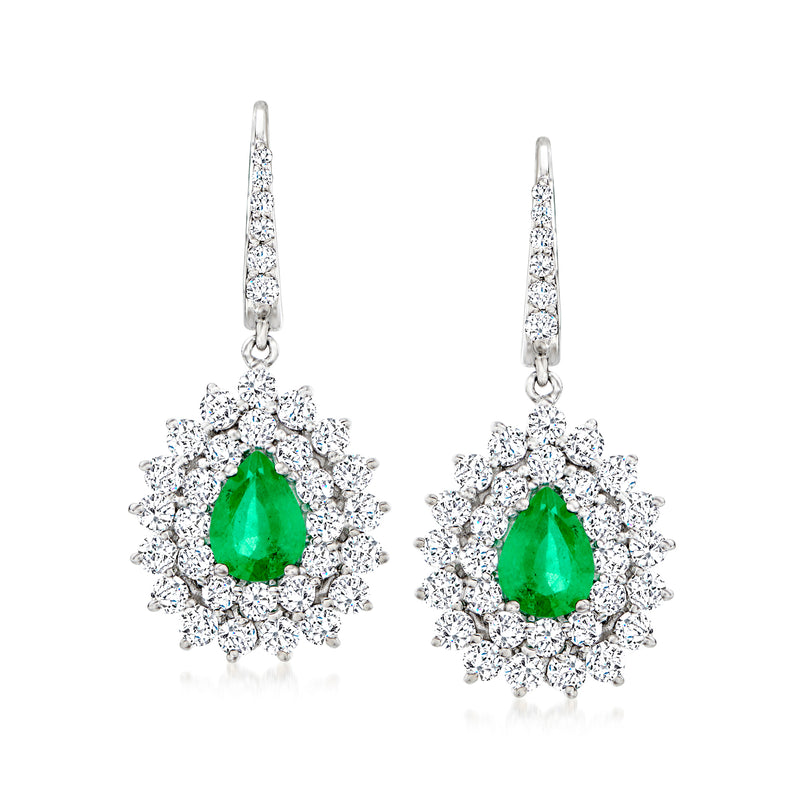 White gold drop earrings with green pear gemstone and diamond halo