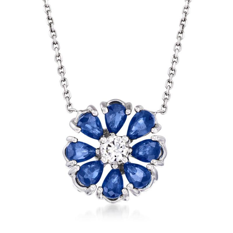 White gold flower necklace with blue sapphire petals and round diamond center