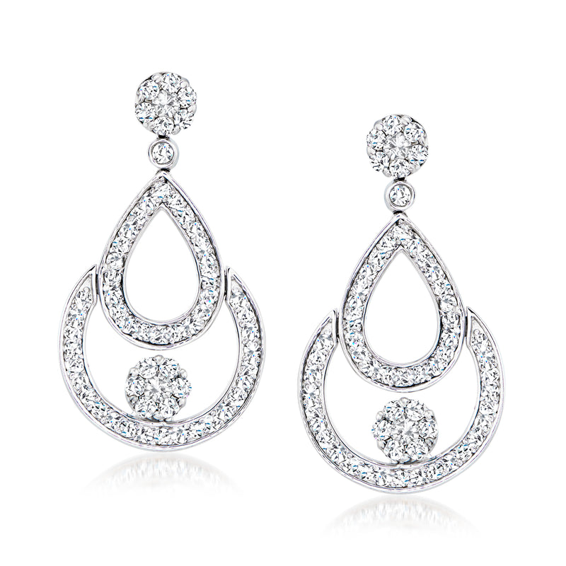Diamond drop earrings in 14kt white gold with round and teardrop shapes