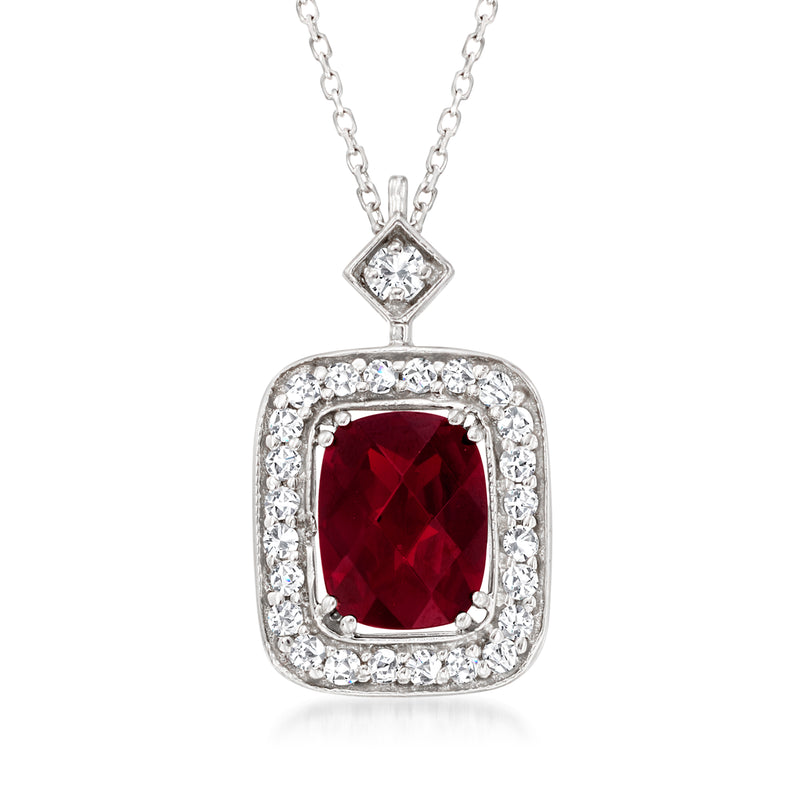 14kt white gold necklace with red garnet center and diamond halo pendant