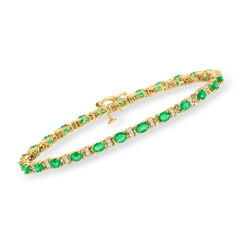 14kt yellow gold tennis bracelet with green emerald and diamond accents