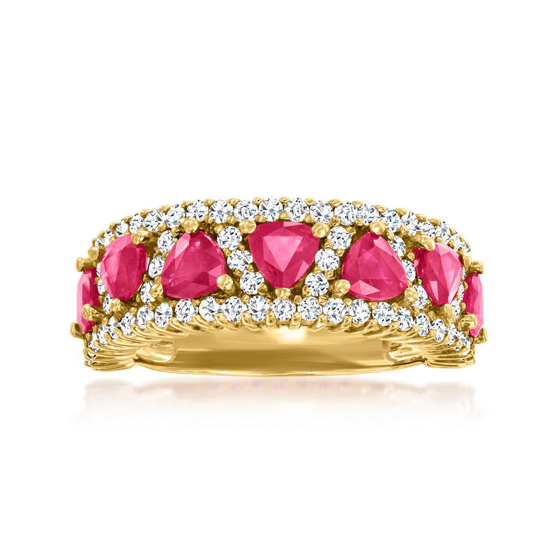 14kt yellow gold ring with three pink oval rubies and round diamond halo accents