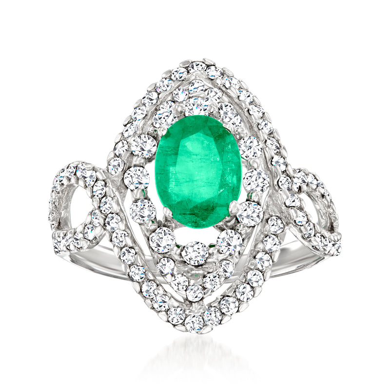 14kt white gold ring with oval green emerald center and surrounding round diamonds