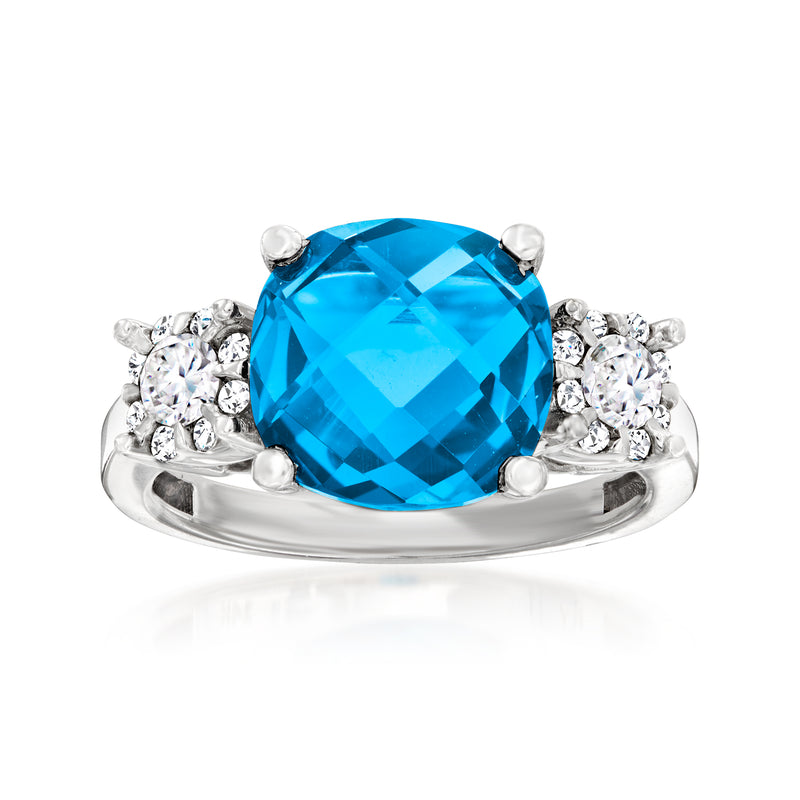 14kt white gold ring with large London blue topaz center and diamond halo accents