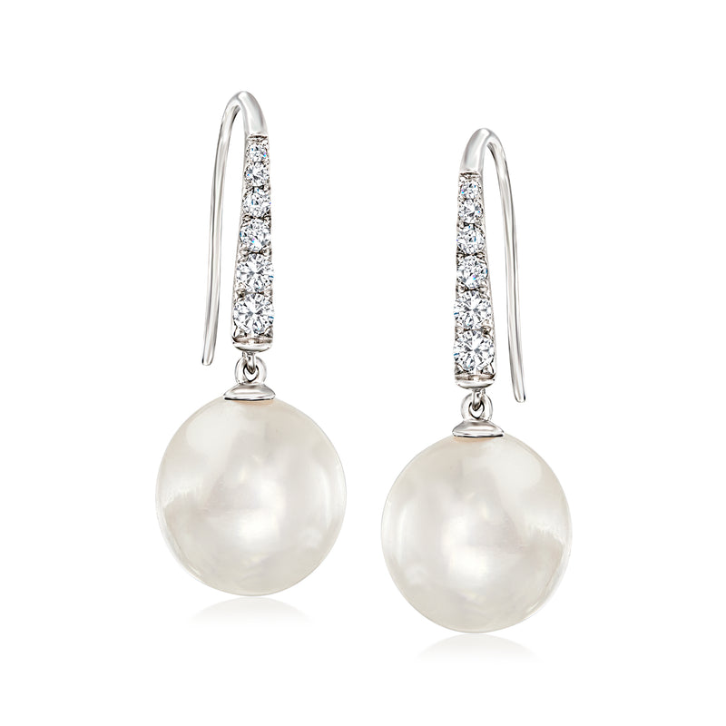 White gold drop earrings with round cultured pearl and diamond-accented top