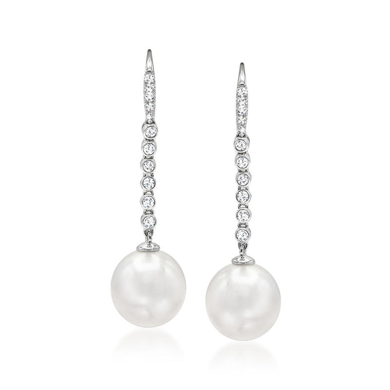18kt white gold drop earrings with large white pearl and sparkling diamond linear accents