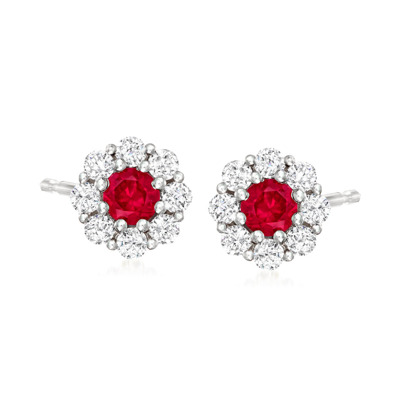 14kt white gold post earrings with red ruby center and diamond halo