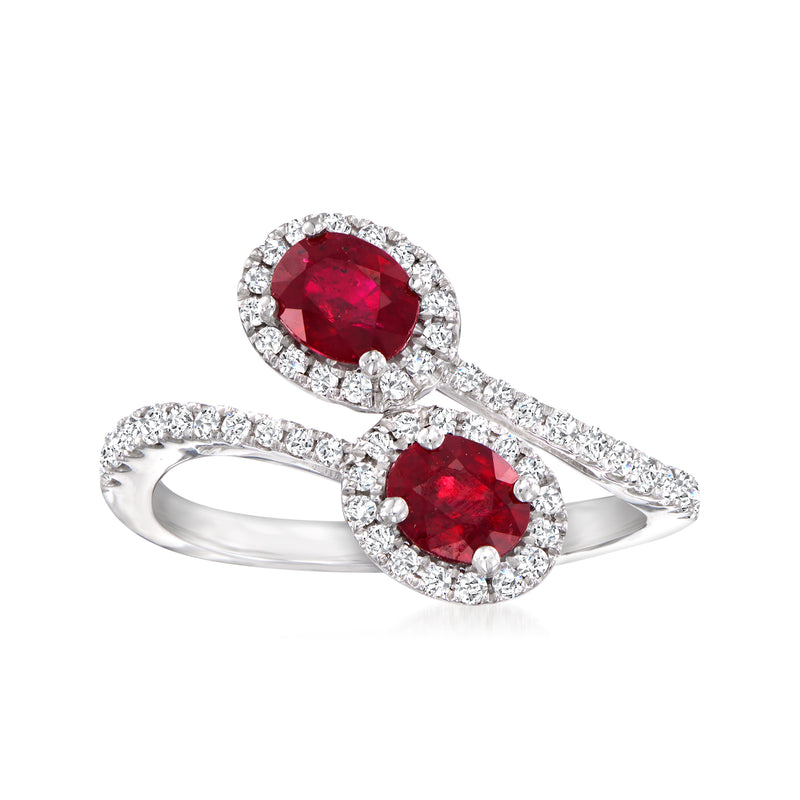 14kt white gold bypass ring with two red oval center stones and diamond halos