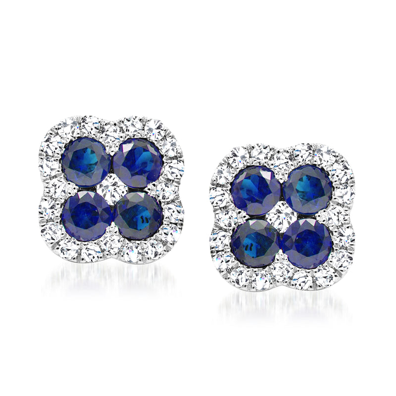 Blue sapphire flower stud earrings with diamond halo and 14kt white gold post