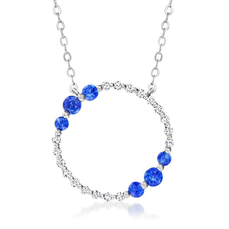 14kt white gold circle sapphire and diamond pendant necklace with blue stones