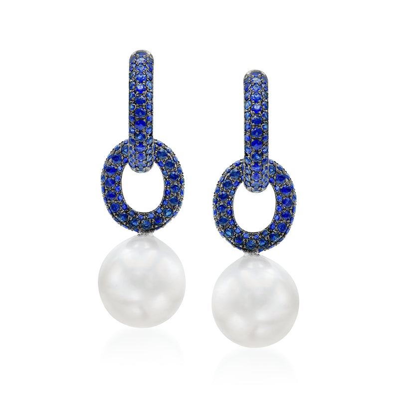 Blue sapphire hoop drop earrings with white cultured pearl drops in white gold.