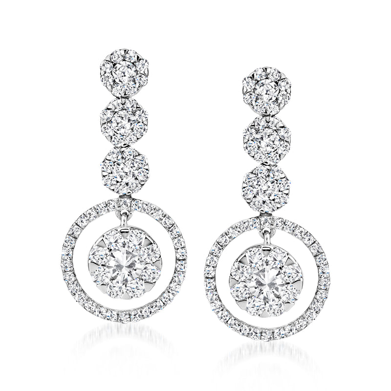 14kt white gold diamond drop earrings with circular halo and three-tier stones