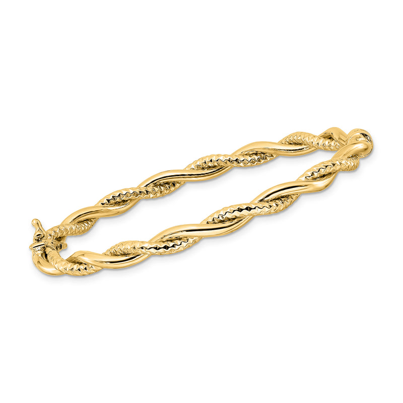 14kt yellow gold twisted bangle bracelet with rope-texture oval links
