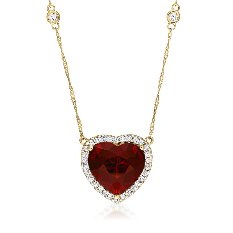 14kt yellow gold heart necklace with red garnet center and diamond halo
