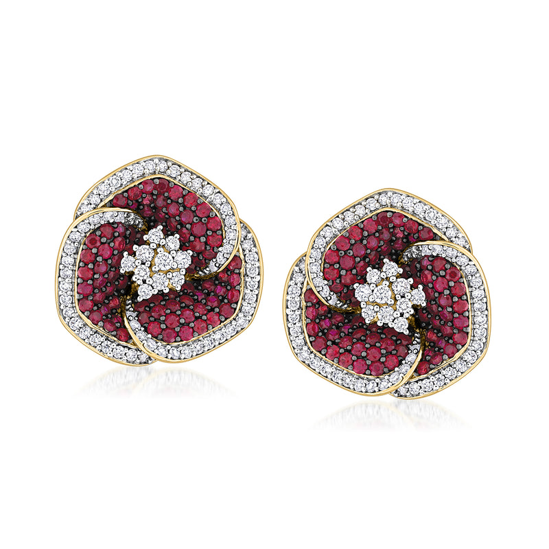 Ruby and diamond flower post earrings in 14kt yellow gold