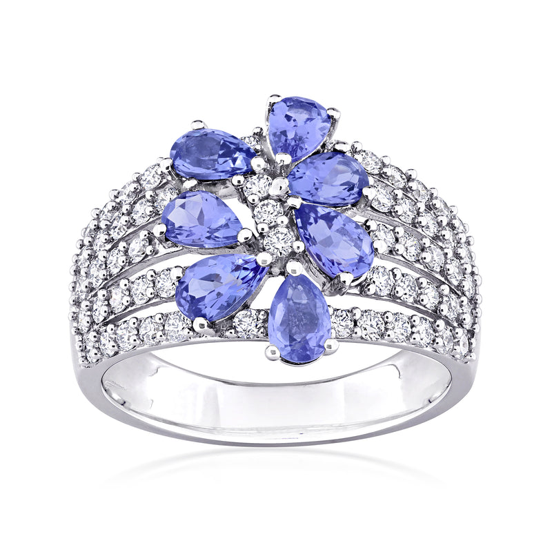 14kt white gold ring with oval blue tanzanite center and diamond pave rows