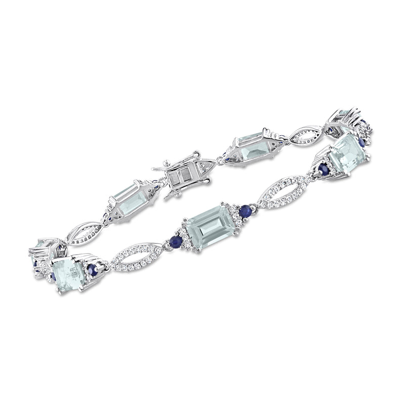Sterling silver bracelet with rectangular aquamarine, sapphire accents, and diamond halos