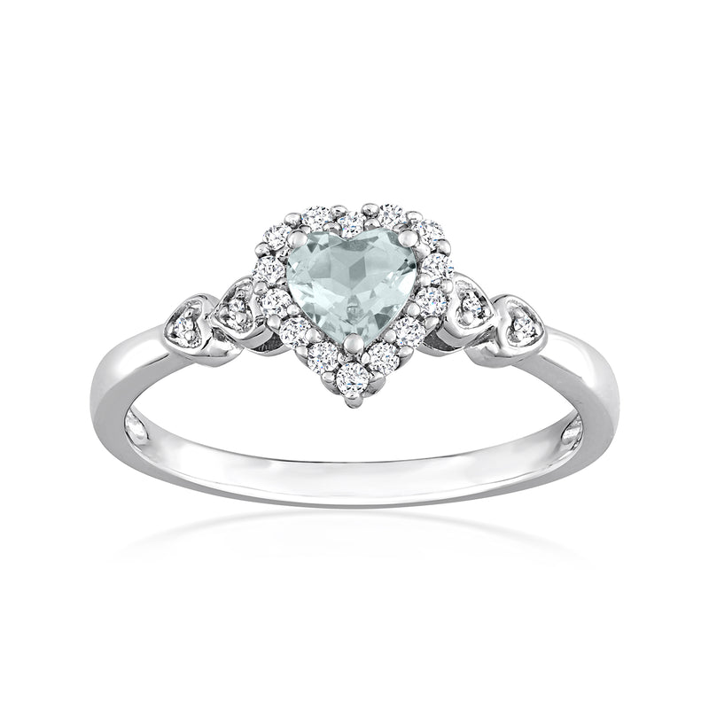 Heart-shaped aquamarine ring in sterling silver with white gemstone halo