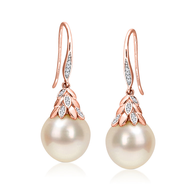 14kt rose gold leaf drop pearl earrings with diamond accents, dangling from wire hooks