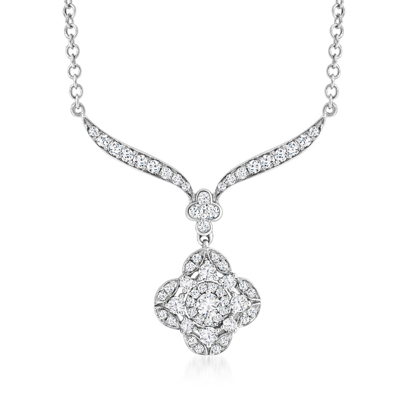 Diamond floral necklace in 14kt white gold with pave leaf links and cluster pendant