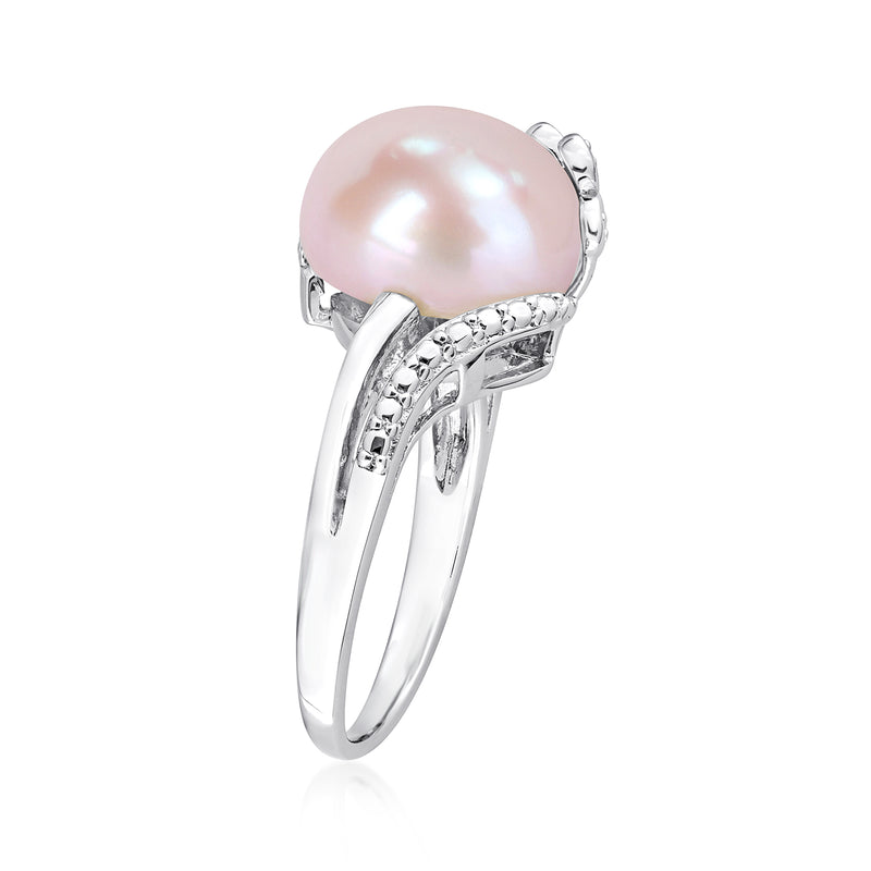 Sterling silver ring featuring a pink cultured pearl with openwork diamond rows
