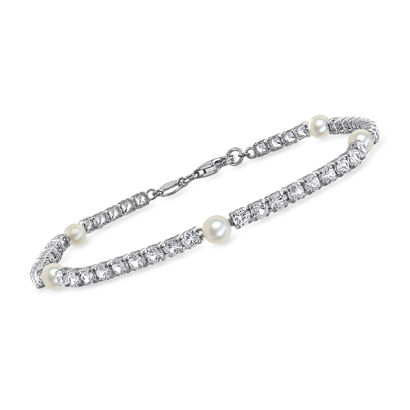 Sterling silver bracelet with white sapphire row stones and three cultured white pearls