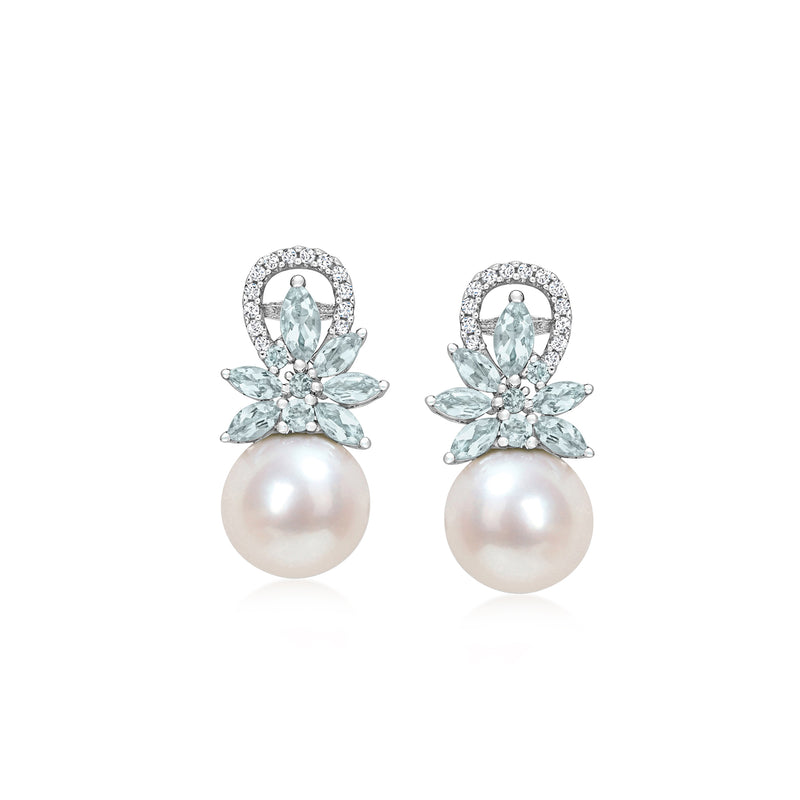 Aquamarine and pearl drop earrings with diamond-like accents in a floral halo setting