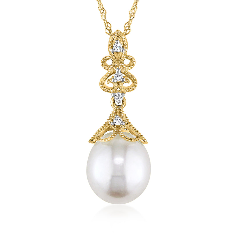 14kt yellow gold pearl pendant necklace with oval white pearl and diamond-like accents