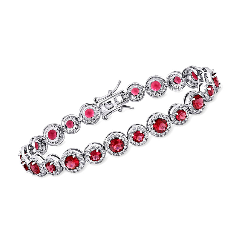 Sterling silver bracelet with red simulated gemstones in oval and round settings, clasp