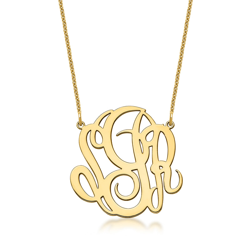 14kt yellow gold monogram necklace with large circular pendant and interwoven letter design