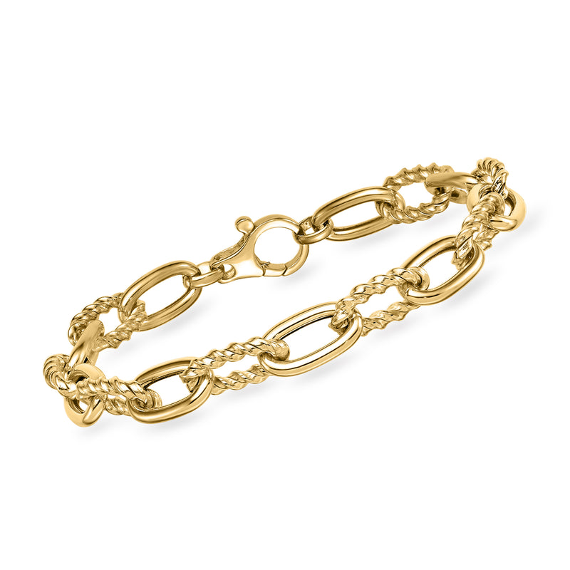 14kt yellow gold twisted-link bracelet with oval clasp and interlinked chain.
