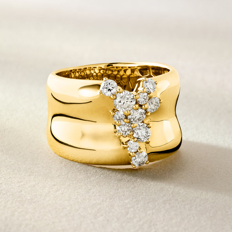 14kt yellow gold diamond ring with a scalloped inner texture and a side view of the cluster