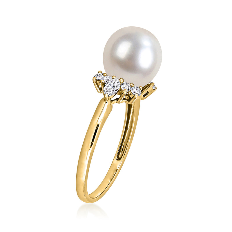 14kt yellow gold ring with white cultured pearl center and diamond accent prongs