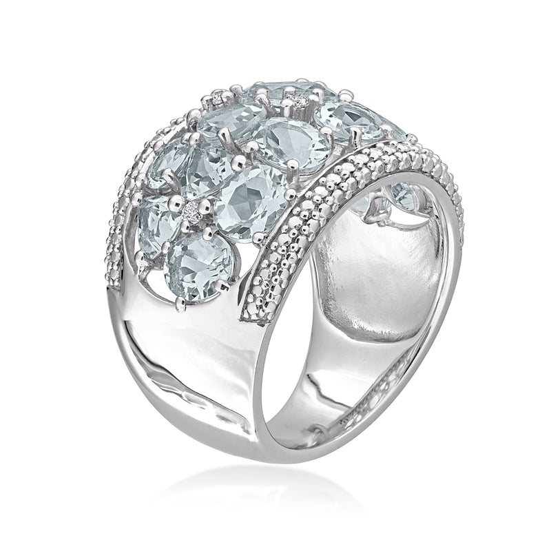 Sterling silver aquamarine ring with diamonds and oval gemstone cluster