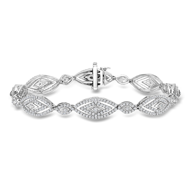 Sterling silver marquise link diamond bracelet with oval-cut stones, hinged clasp.