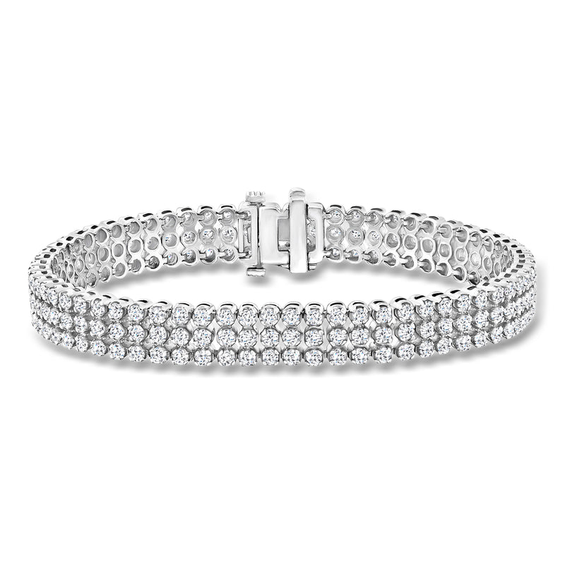 Three-row diamond bracelet in white gold with round stones and center clasp