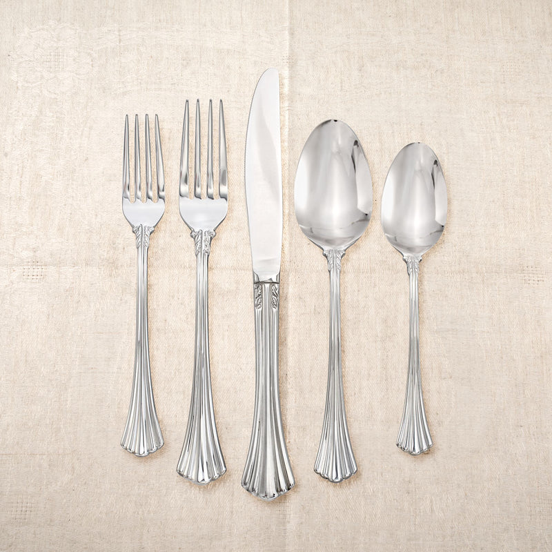 Assorted 18/0 stainless steel forks and spoons with flute-pattern handles