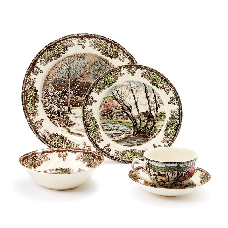 Friendly Village earthenware dinnerware set: plates, bowl, and teacup with saucer