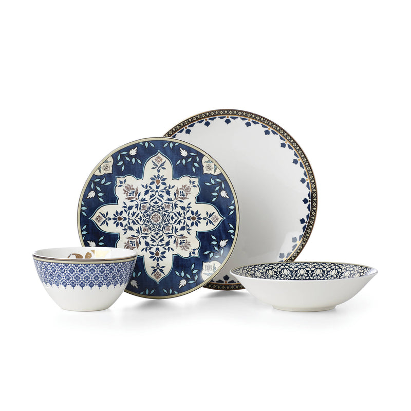 4-piece place setting with blue-and-white floral tapestry plates and bowls